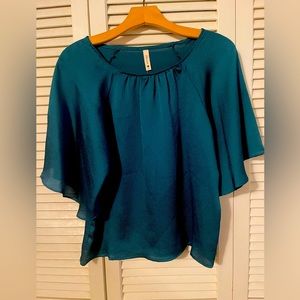 Turquoise blouse, with tags- never been worn, small